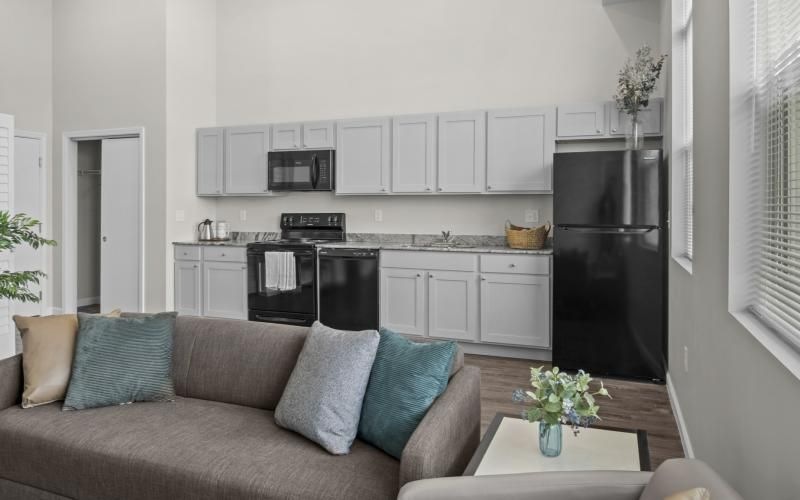 a living room with a couch and a table