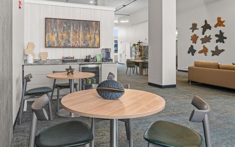 a room with tables and chairs