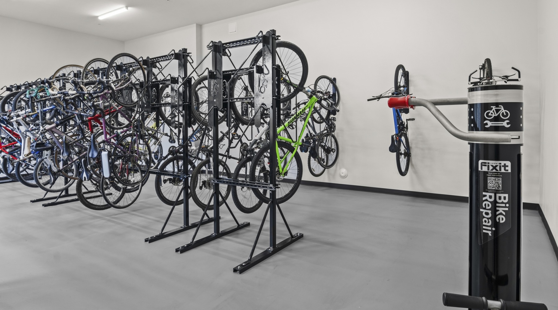 bicycles on a rack in a bright room