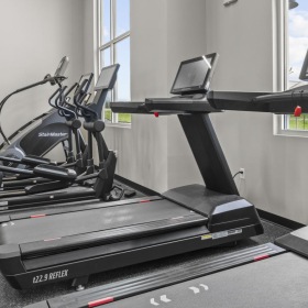 treadmills in a bright room